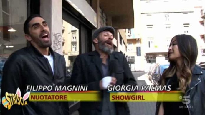 Filippo Magnini e Giorgia Palmas insieme a Striscia la notizia: il motivo | video Filippo Magnini e Giorgia Palmas insieme a Striscia la notizia