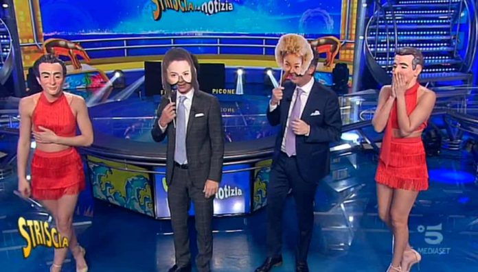 Striscia la notizia 2019, “scambio di facce” tra i conduttori e le veline | video