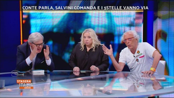 Sgarbi e Mughini, lite e rissa in tv a colpi di sedia e insulti a Stasera Italia | Video Mediaset Stasera Italia, rissa mughini sgarbi