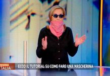 Barbara Palombelli spiega come fare una mascherina con foulard e pellicola: il nuovo tutorial a Stasera a Italia | Video Mediaset Barbara Palombelli con foulard e pellicola a Stasera Italia