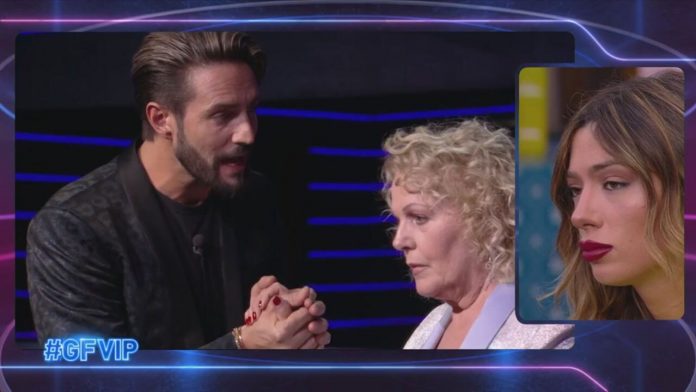 GF Vip, Katia Ricciarelli VS Alex Belli: “Fuori dalla Porta Rossa ti faccio un cu*o così” | Video Mediaset Katia Vs Alex