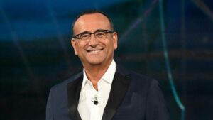 Ascolti tv 14 dicembre 2025: Sarà Sanremo (12.3%), Chi vuol essere milionario (19.7%), Che tempo che fa (9.6%), Affari Tuoi (22.8%), La Ruota della Fortuna (25.5%) | Dati Auditel