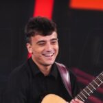 Tu Si Que Vales 2026, Alessandro Malerba incanta con Pino Daniele. Paolo Bonolis a Stefano De Martino: «Lo porterei a Sanremo» Alessandro a "Tu Si Que Vales"